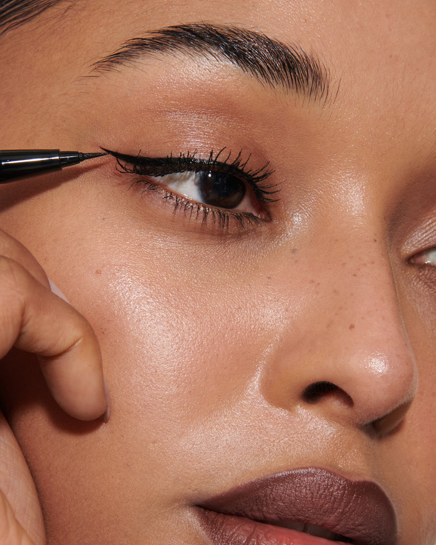 kitten flick black eyeliner eyeshadow makeup for dark brown eyes and weddings, primary_meta_image