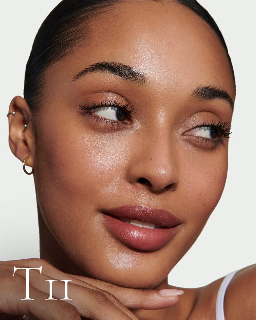 numbered Close up portrait of model wearing T11 with text displaying so