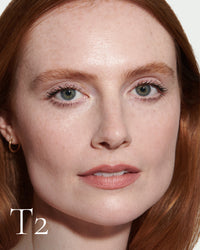 block The white pod packaging of Seamless Skin Enhancing Tint by Lisa Eldridge