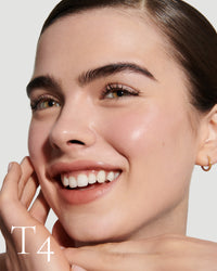 block The white pod packaging of Seamless Skin Enhancing Tint by Lisa Eldridge